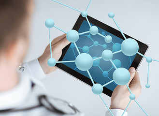 Image showing close up of doctor with stethoscope and tablet pc