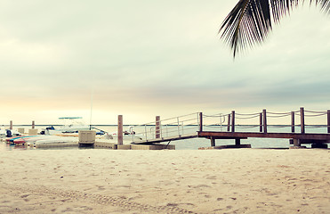 Image showing boats moored to pier