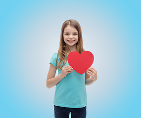 Image showing smiling little girl with red heart