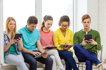 Image showing smiling students with tablet pc computer