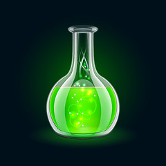 Image showing Transparent flask with magic green liquid on black background.