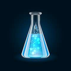 Image showing Transparent flask with magic blue liquid on black background.