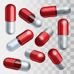 Image showing Set of red and transparent medical capsules in different positions