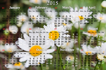 Image showing calendar for 2015 year on the white camomiles background