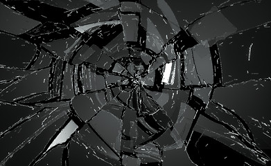 Image showing Shattered or damaged glass Pieces on black