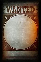 Image showing Wanted poster printed on a grunge wall