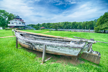 Image showing An old rowing boat in need of repair