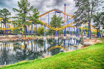 Image showing rollercoaster rides at an amusement park