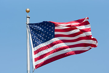 Image showing American flag on the blue sky