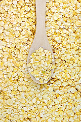 Image showing Pea flakes texture with a spoon