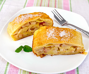 Image showing Strudel with pears on tablecloth