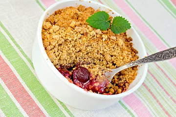 Image showing Crumble cherry on napkin