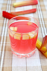 Image showing Compote from rhubarb in glass on tablecloth