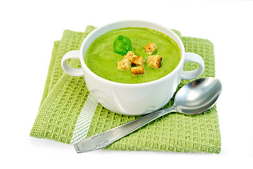 Image showing Soup puree with spinach and napkin