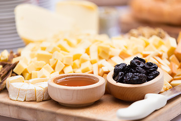 Image showing Cheese Plate with Dried Fruit and Honey 