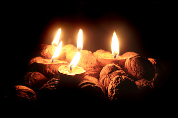 Image showing christmas wallnuts candles
