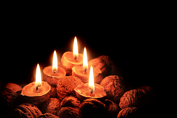 Image showing christmas wallnuts candles