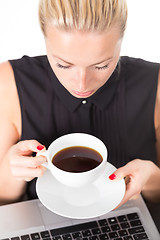 Image showing Business woman with cup of coffee.