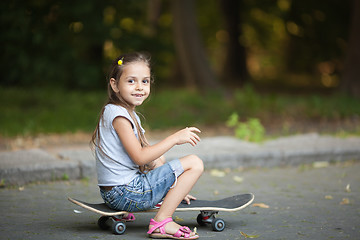 Image showing Little girl on skateboard