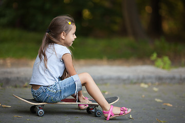 Image showing Little girl on skateboard