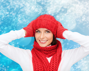 Image showing smiling young woman in winter clothes