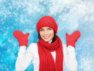 Image showing smiling young woman in winter clothes