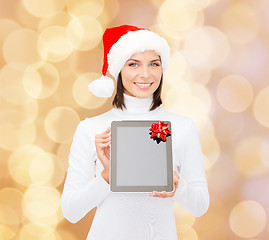 Image showing woman in santa helper hat with tablet pc