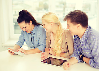 Image showing smiling students with tablet pc computer at school