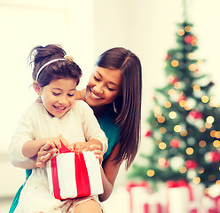 Image showing happy mother and child girl with gift box