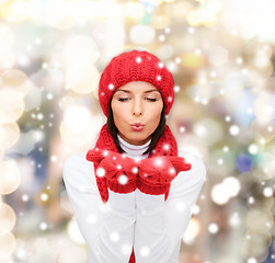 Image showing smiling young woman in winter clothes