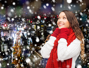 Image showing smiling young woman in winter clothes