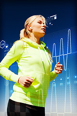 Image showing fit woman doing running outdoors