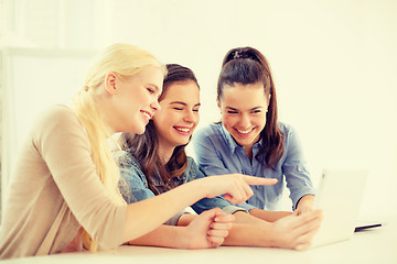 Image showing smiling students with tablet pc computer at school