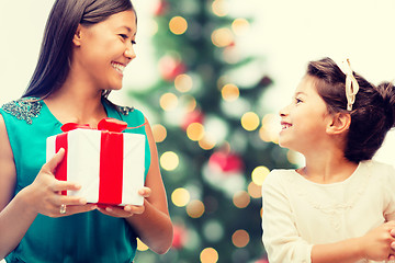 Image showing happy mother and child girl with gift box