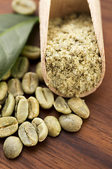 Image showing Green coffee beans with leaf