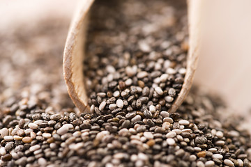 Image showing Nutritious chia seeds on a wooden spoon