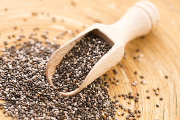 Image showing Nutritious chia seeds on a wooden spoon