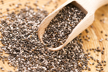 Image showing Nutritious chia seeds on a wooden spoon