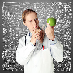 Image showing scientist woman with apple