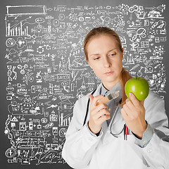 Image showing scientist woman with apple