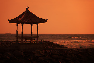 Image showing Gazebo on the ocean shore at sunset. Indonesia, Bali