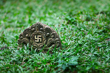 Image showing Tombstone with the image of ancient symbol - the swastika