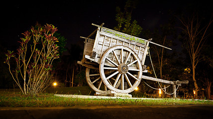 Image showing Old wooden wagon in the park - original decoration for landscapi