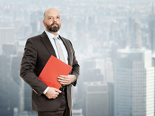 Image showing business man with red folder