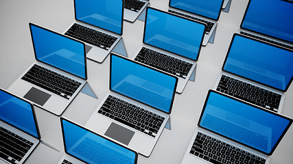 Image showing 3d image of a lot of laptops in a rows.