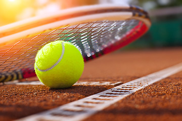 Image showing 	tennis ball on a tennis court