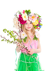 Image showing Llittle girl with flowering branches