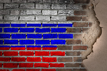 Image showing Dark brick wall with plaster - Russia