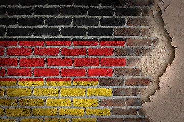 Image showing Dark brick wall with plaster - Germany