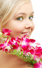 Image showing lovely blond with orchid